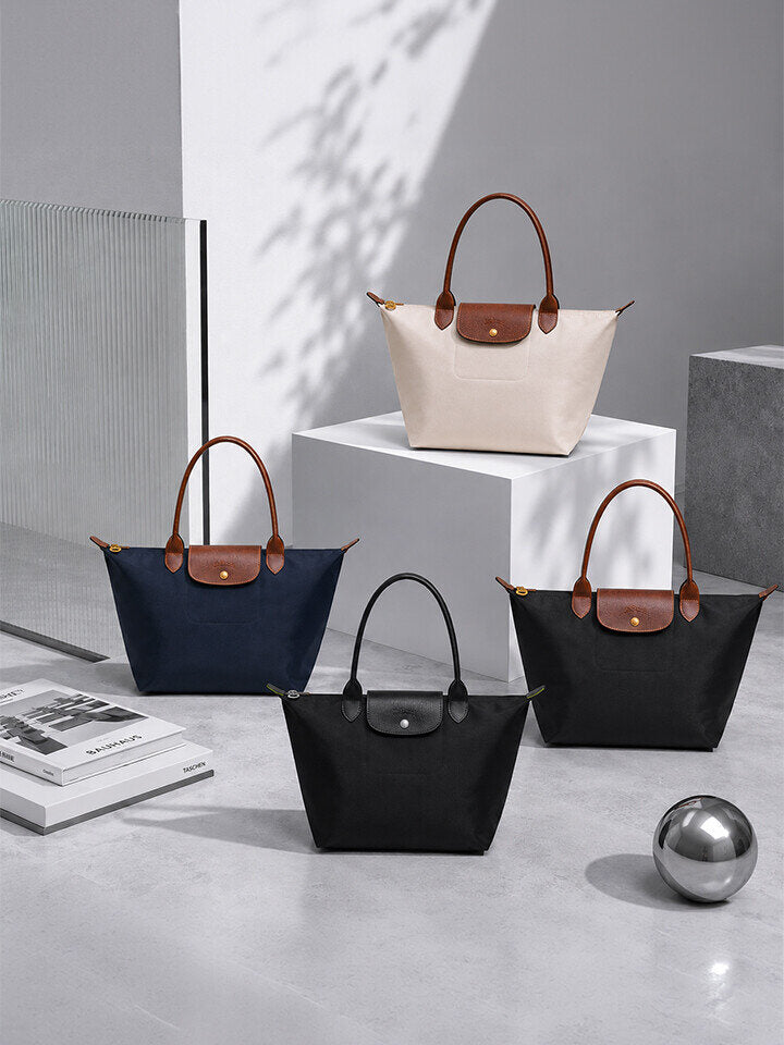 Longchamp Le Pliage M and L tote bags — original supplier hero image